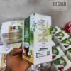 Custom printed green tea boxes displayed on a retail shelf