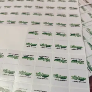 Custom tea bag hang tag attached to a tea bag
