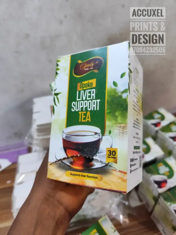 Window-cut green tea box showing loose leaf tea inside